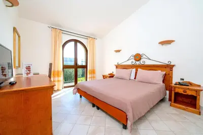 Letto o letti in una camera di Hotel with swimming pool in Arborea just 650 meters from the sea