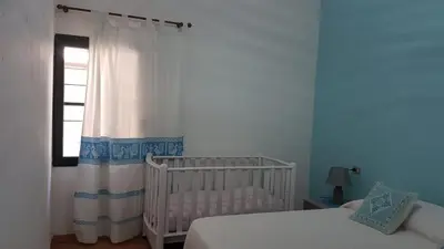 Letto o letti in una camera di VILLETTA Panoramica FRONTE MARE