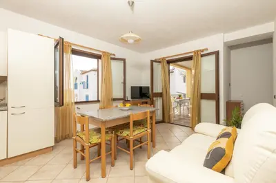 TV o dispositivi per l'intrattenimento presso Casa Sa Montera A - appartamento con balcone