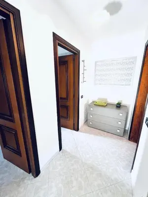 Letto o letti in una camera di Casa vacanze alla Maddalena Spiaggia