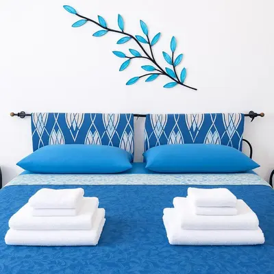 Letto o letti in una camera di B&B Nel Giardino In Fiore