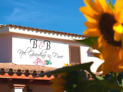 Certificato, attestato, insegna o altro documento esposto da B&B Nel Giardino In Fiore