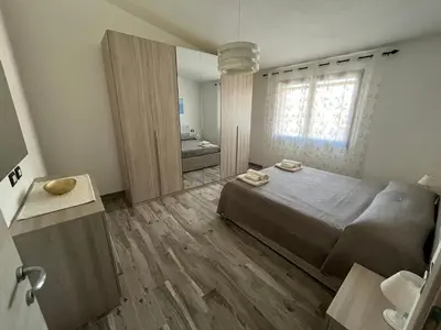 Letto o letti in una camera di Casa Alma