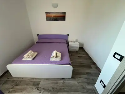 Letto o letti in una camera di Casa Alma