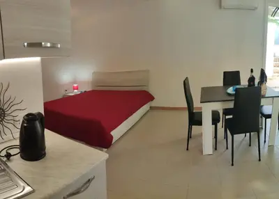 Letto o letti in una camera di Casa Vacanze Sole della Sardegna