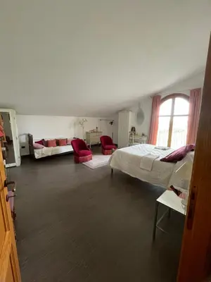 Letto o letti in una camera di Les Lauriers, chambre d'hôtes