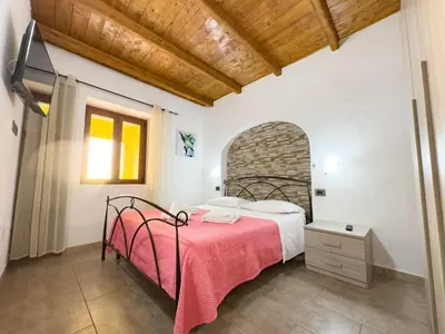Letto o letti in una camera di Domu Teresa