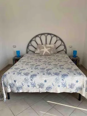 Letto o letti in una camera di Paradise il Geco
