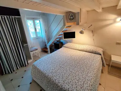 Letto o letti in una camera di VILLA with pool SU PREPPA 'S AUS