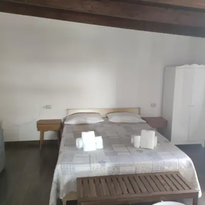 Letto o letti in una camera di Cecilia's House Cagliari Centro
