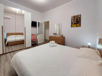 Letto o letti in una camera di Vivamus