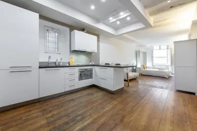 Cucina o angolo cottura di LUMEN Old Town Loft