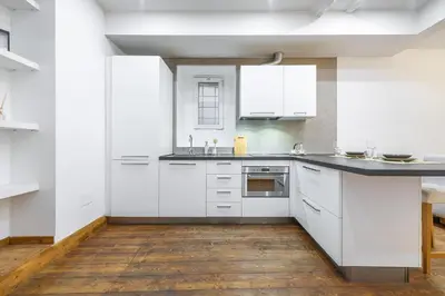 Cucina o angolo cottura di LUMEN Old Town Loft