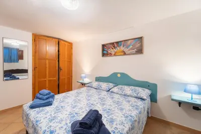 Letto o letti in una camera di Villa degli Angeli - Appartamento Portopinetto