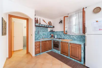 Cucina o angolo cottura di Villa degli Angeli - Appartamento Portopinetto