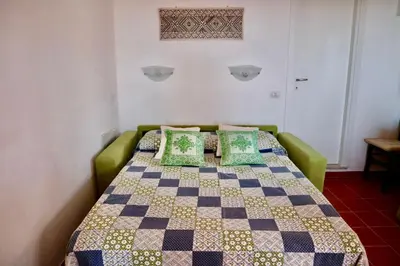 Letto o letti in una camera di Salina Holiday Home studio flat
