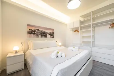 Letto o letti in una camera di Lumen - Downtown Vibes