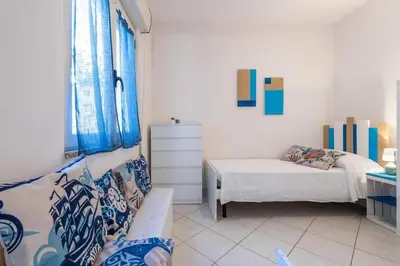 Letto o letti in una camera di Domo Coro e Bentu