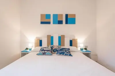 Letto o letti in una camera di Domo Coro e Bentu