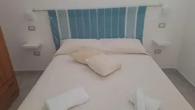 Letto o letti in una camera di Domu Loca
