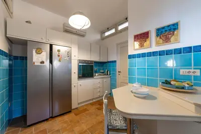 Cucina o angolo cottura di Villa Grace Home Holiday 50 mt from the sea