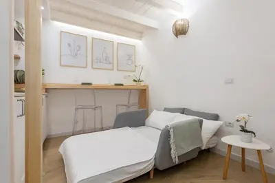 Letto o letti in una camera di Loft La Torre