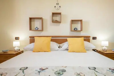 Letto o letti in una camera di Private pool - 1 minute from the sea - Ampia e accessoriata