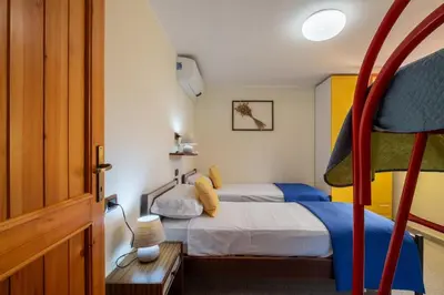 Letto o letti in una camera di Private pool - 1 minute from the sea - Ampia e accessoriata