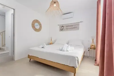 Letto o letti in una camera di Casa Nouè