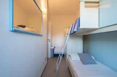 Letto o letti in una camera di 2 minutes' walk from the sea- cozy ande full-equipped house
