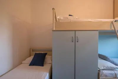 Letto o letti in una camera di 2 minutes' walk from the sea- cozy ande full-equipped house