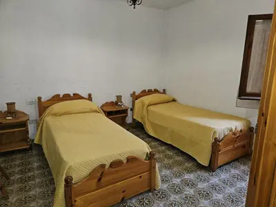 Letto o letti in una camera di Cinema & Stars by Paola