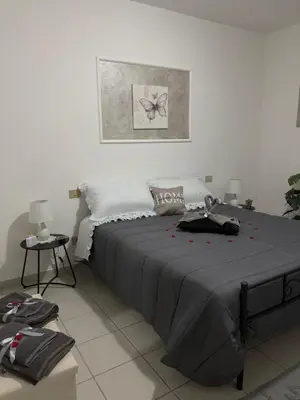 Letto o letti in una camera di Appartamento Corso Colombo