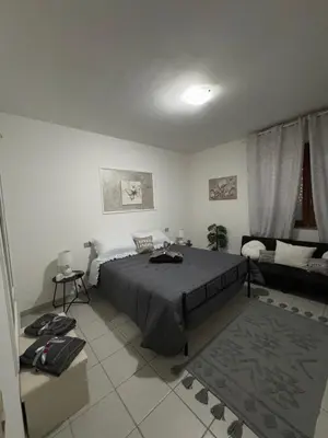 Letto o letti in una camera di Appartamento Corso Colombo