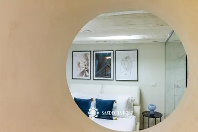 Area soggiorno di Sardegna Host Suite Brezza Marina