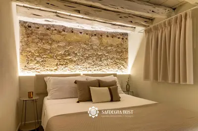 Letto o letti in una camera di Sardegna Host Il Nido