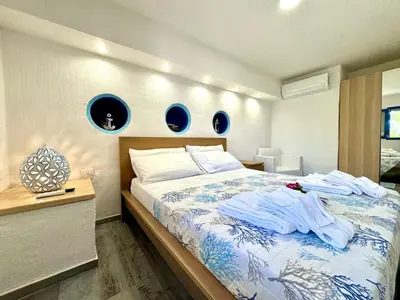 Letto o letti in una camera di Sunrise Beach House