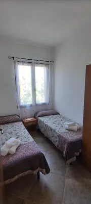 Letto o letti in una camera di Sa Domu De Pardinu