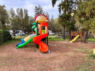 Area giochi per bambini di Holiday Home Camping Iscrixedda by Interhome