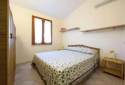 Letto o letti in una camera di I gigli del mare