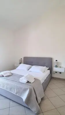 Letto o letti in una camera di Casa Rokaria31