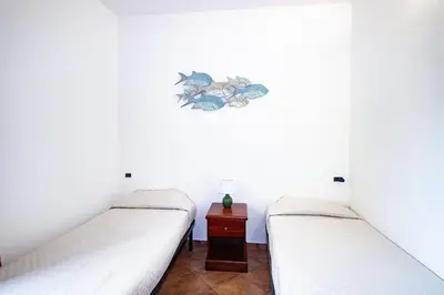 Letto o letti in una camera di S'Armidda