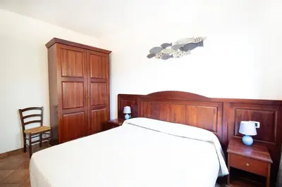Letto o letti in una camera di S'Armidda