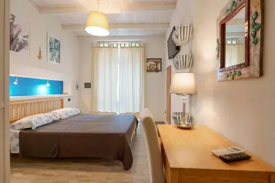 Letto o letti in una camera di La Risacca B&B