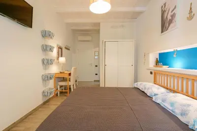 Letto o letti in una camera di La Risacca B&B