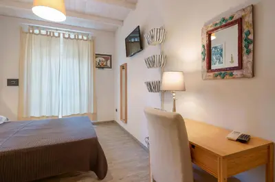Letto o letti in una camera di La Risacca B&B