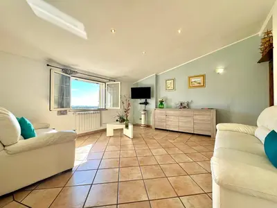 Area soggiorno di Mavi Apartment
