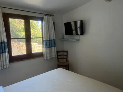 Letto o letti in una camera di La PAVONCELLA 1