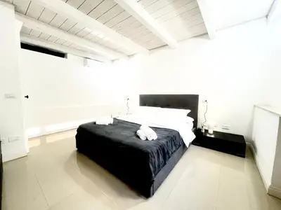 Letto o letti in una camera di La Costa nel Corso