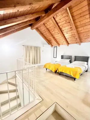 Letto o letti in una camera di La Costa nel Corso